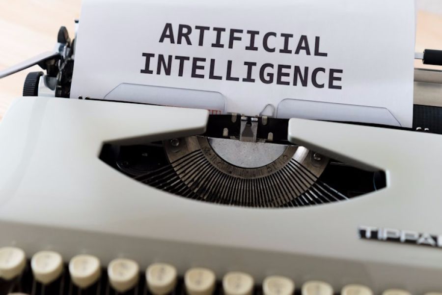 machine à écrire indiquant "artificial intelligence"